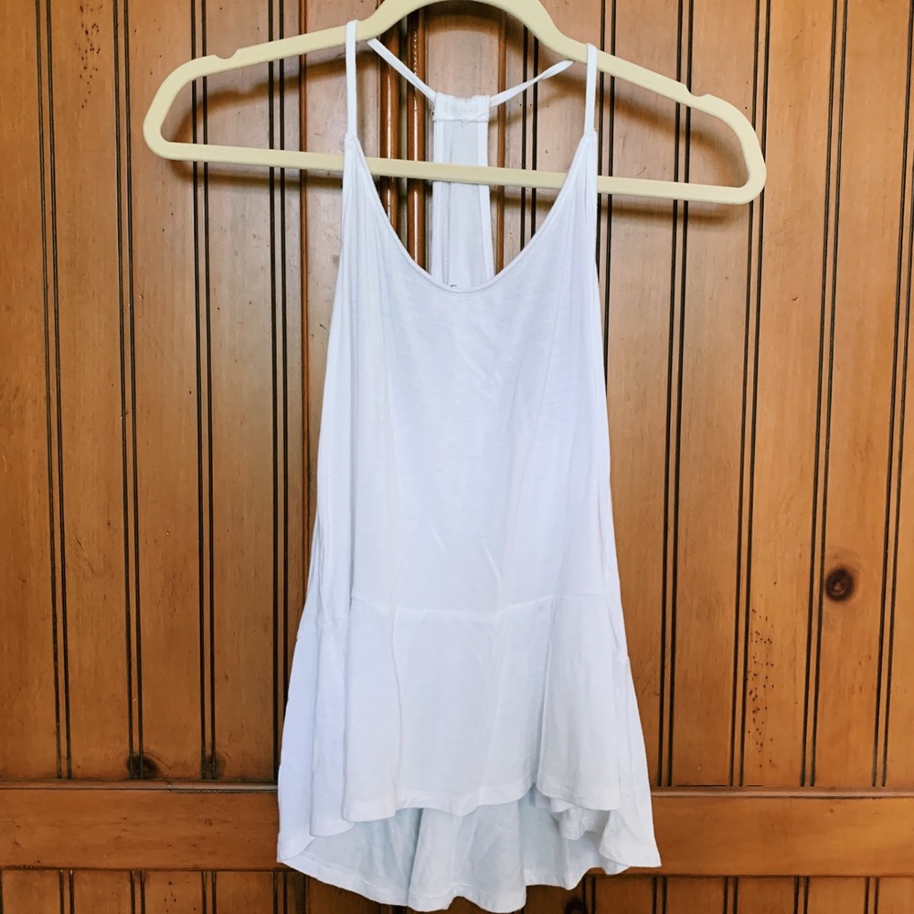 white flowy bottom tank